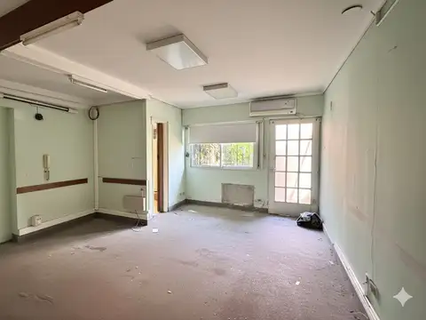 Casa Multifamiliar con Jardín y Quincho