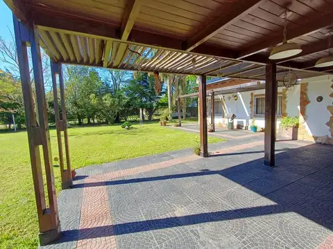 VENTA CASA EN FUNES CON PILETA Y DOS DORMITORIOS