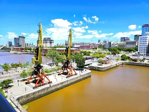 ALQUILER Piso bajo al DIQUEy peatonal de 2 Suites y dependencias  2 cocheras Para ingresar