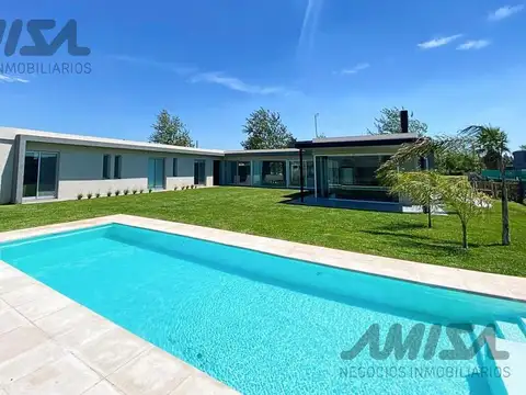 VENTA CASA MODERNA EN PUERTO ROLDAN - 3 DORMITORIOS 2 COCHERAS