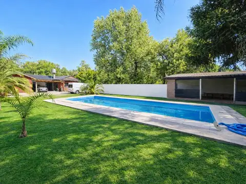 VENTA CASA 3 AMBIENTES LA REJA. PILETA Y QUINCHO