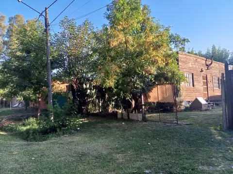 Casa estilo cabaña, construida en sistema woodframe.