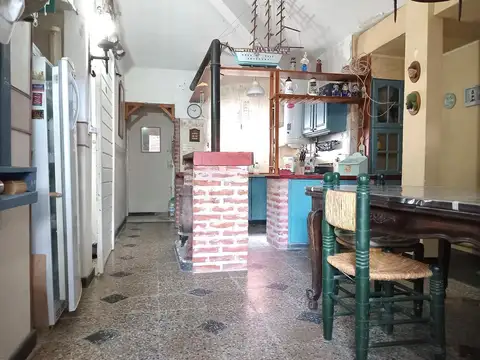 CASA EN PH AL FRENTE COCHERA PATIO Y JARDÍN