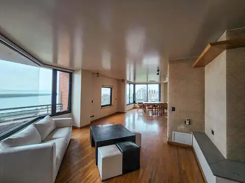 Departamento de 4 dormitorios con 3 cocheras y vista al río frente a la aduana