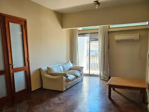 Av. General Paz 100, Piso 8