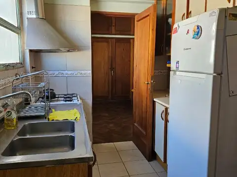 Av. General Paz 100, Piso 8