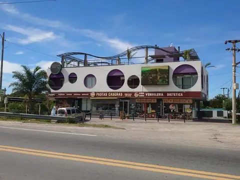 EDIFICIO DE LOCALES Y DEPARTAMENTOS VILLA DEL LAGO