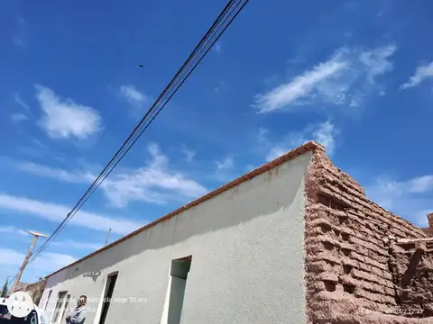 TERRENO CON CASA DE ADOBE A RESTAURAR- CENTRO VINCHINA