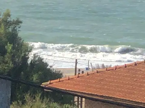 LOTE CON SALIDA A DOS CALLES PASEO 124 Y PASEO 123 BIS ENTRE PASEOS 1 Y 2 MUY CERCANO A LA PLAYA,