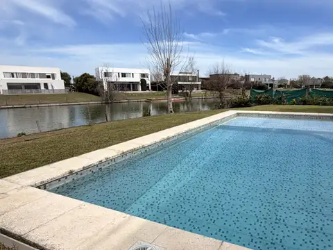 Casa 5 dormitorios En El Cantón En Alquiler Opción a Compra A la Laguna Amoblada