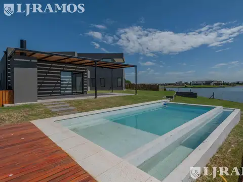 Casa a la laguna en Área 1 – Pileta infinita y vista abierta | San Sebastián | MB