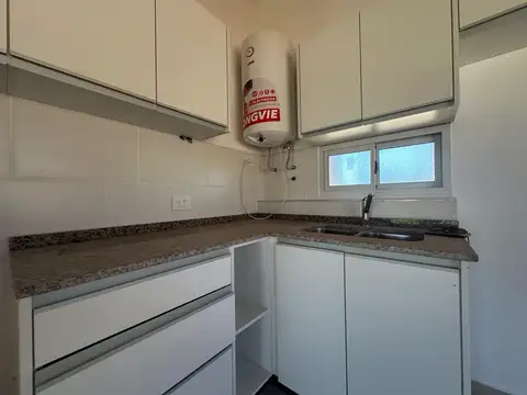 Venta - Casa a estrenar de dos dormitorios con jardín, galería y cochera en Pueblo Esther