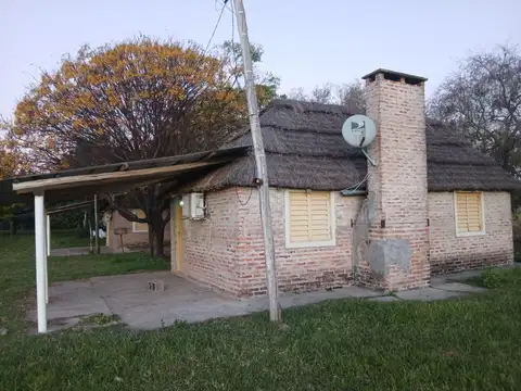 Complejo con dos cabañas y una vivienda