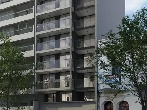 VENTA - Departamento dos Dormitorios con patio, 1° piso, centro, Rosario