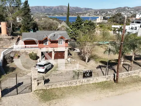 VENTA CASA DE CAMPO DE 3 DORMITORIOS, PILETA, 1.900M² DE TERRENO B° VILLA DEL LAGO-CARLOS PAZ