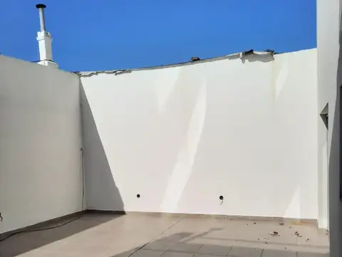 DEPARTAMENTO DOS AMBIENTES  CON PATIO AMPLIO