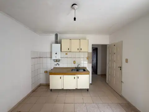 Departamento en planta alta con doble balcón