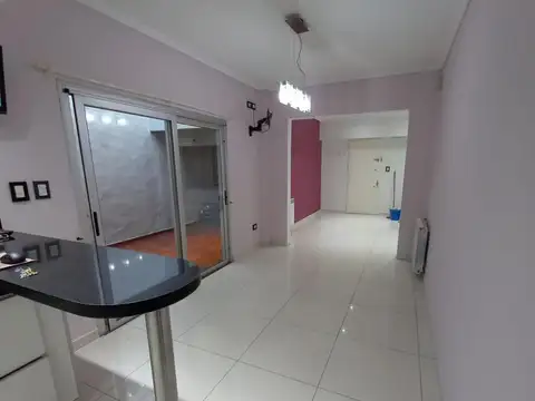 Casa en venta de 5 ambientes con cochera, jardín y quincho