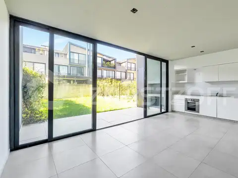 Departamento de 3 ambientes con Jardin propio