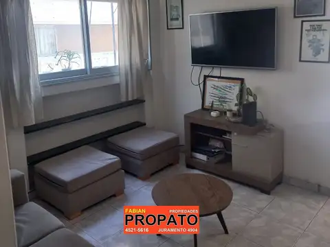 Depto de 3 ambientes en un 12° piso al frente con balcón, cochera fija cubierta y baulera 