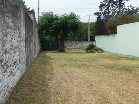 Terreno con mejoras