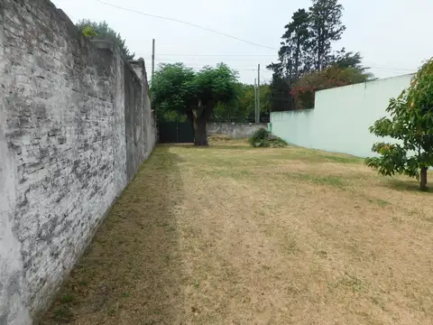 Terreno con mejoras
