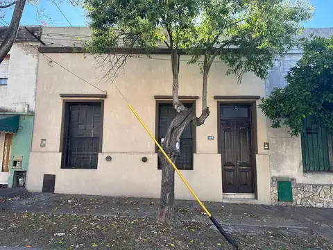 Casa céntrica con jardín