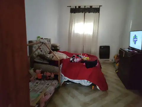 Casa céntrica con jardín