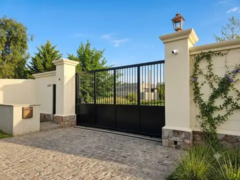 Lote en barrio cerrado sobre calle alzaga