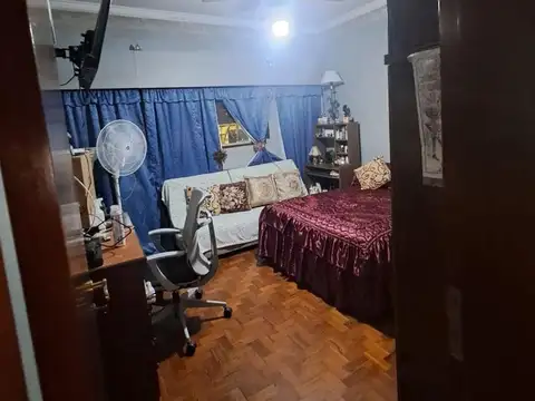 CASA EN DE 4 AMBIENTES CON QUINCHO Y GARAGE  