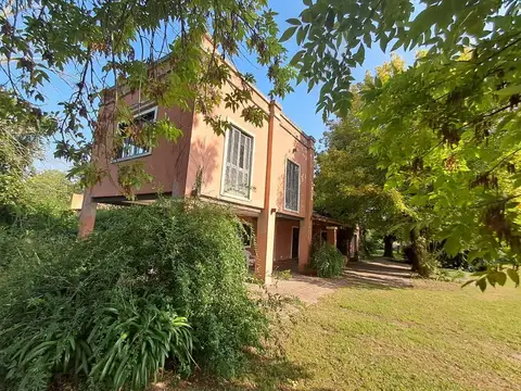 Casa 7 ambientes con 2 baños