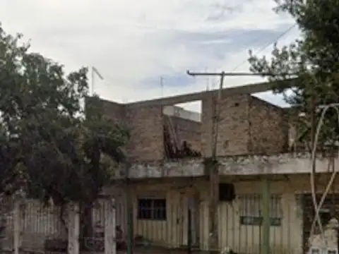 VIVIENDA CON DOS GALPONES