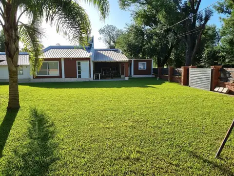 Casa en venta - 2 dormitorios con QUINCHO Y PILETA, ANDINO, Sta Fe.