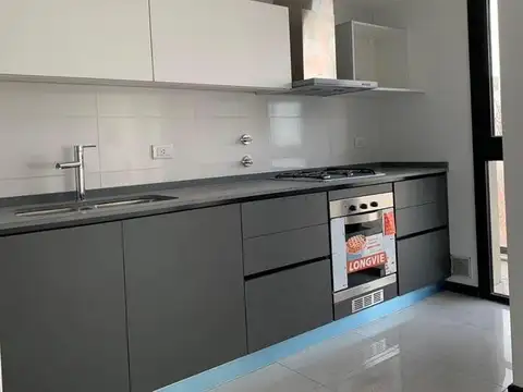 DEPARTAMENTO DE DOS AMBIENTES CON COCHERA A ESTRENAR