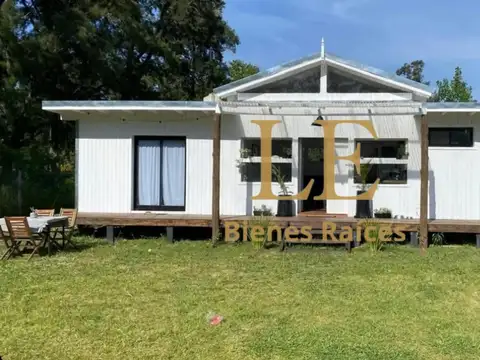 VENTA CASA CON RENTA