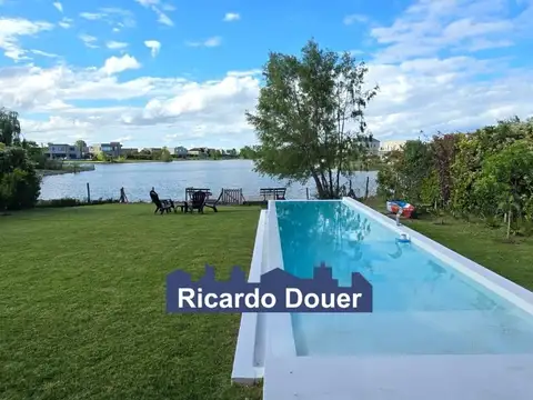 Casa en alquiler de verano con salida a la laguna y pileta climatizada-El Cantón