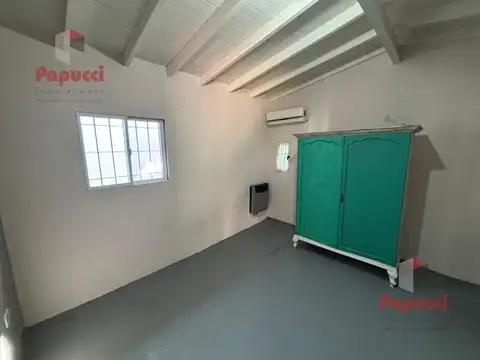 Casa multifamiliar con 3 viviendas