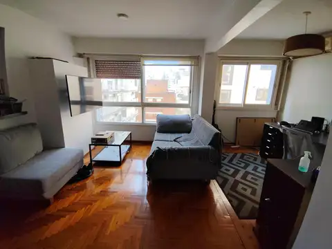 Departamento de tres ambientes con cochera en el centro de Martínez