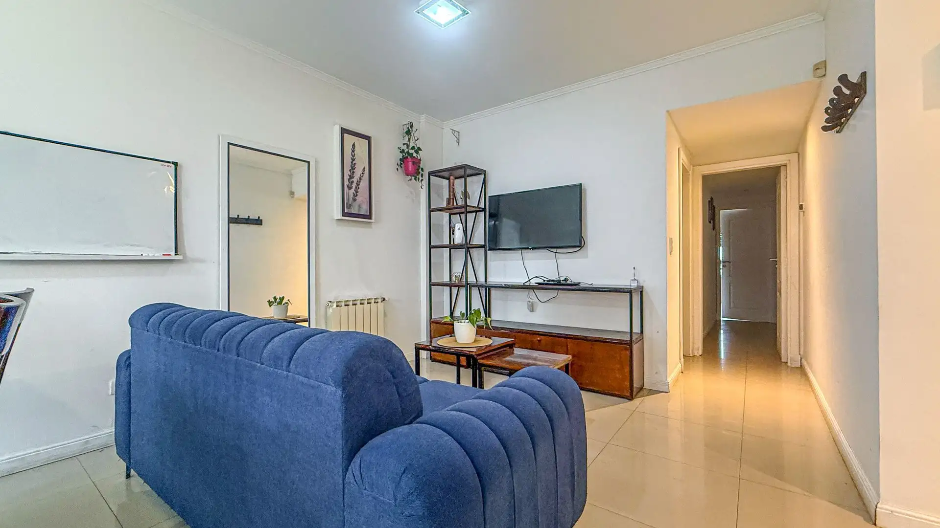 VENTA DPTO 4 AMBIENTES AL FRENTE LA PERLA COCHERA