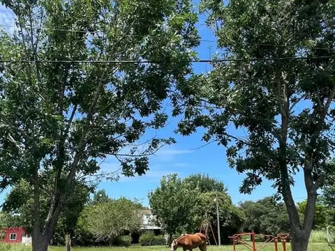 Lote en barrio Caima a metros del río.