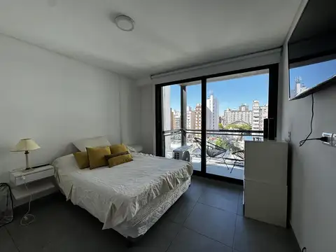 Departamento amueblado con terraza exclusiva y cochera doble en alquiler