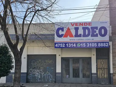 CASA CON LOCAL Y GARAGE SOBRE AVENIDA