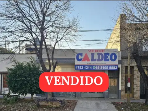 CASA CON LOCAL Y GARAGE SOBRE AVENIDA