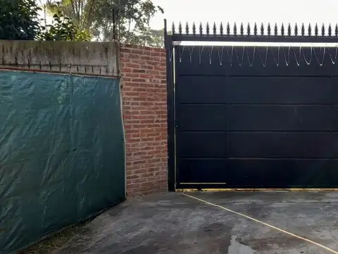 Lote en venta en Garin con quincho y pileta 