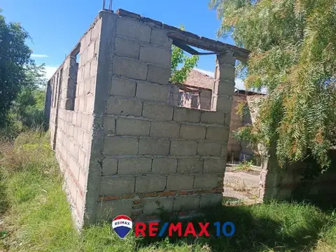 Terreno con Mejoras
