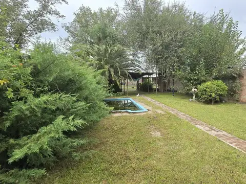 Venta / Permuta casa con pileta. Lote 440 m2 forestado y parquizado. Pueblo Esther