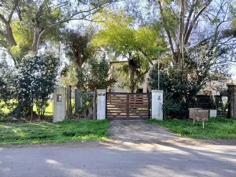 Venta casa dos dormitorios - Terreno 450 m2 - FUNES (garita 15)