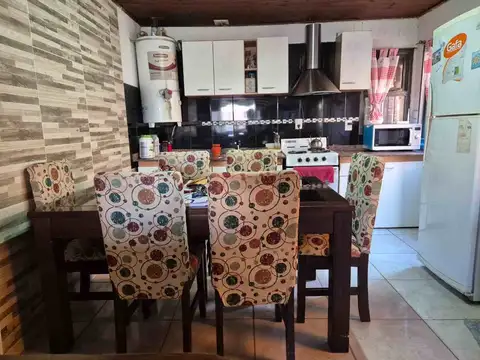 VENTA CASA CON DEPARTAMENTO EN CIPOLLETTI 