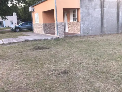 Amplio terreno con casa y excelente ubicación
