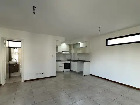 Departamento en alquiler de un dormitorio norte zona pichincha escalera moderno amplio
